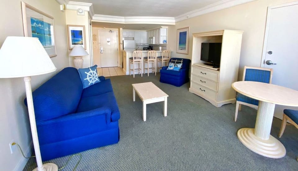 Luxury Studio Suite, 1 Bedroom, Kitchen, Ocean View | Living area | 42-inch TV with cable channels