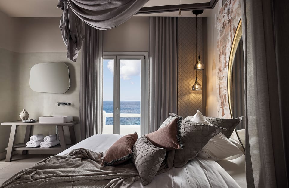 Triple Sea View Suite | Bathroom | Shower, rainfall showerhead, hair dryer, bathrobes