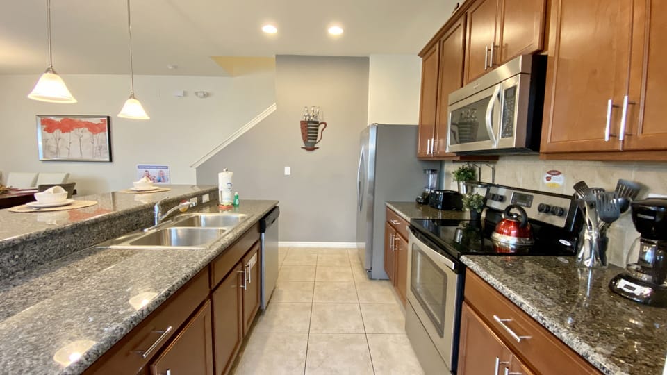 Enjoy the spacious, modern kitchen design with ample counter space.
