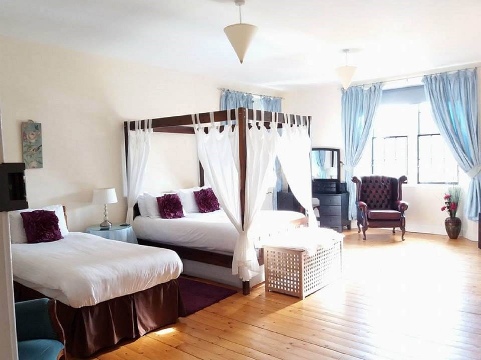 Deluxe Double Room, Ensuite, Mountain View (Four Poster) | Individually decorated, individually furnished, blackout drapes