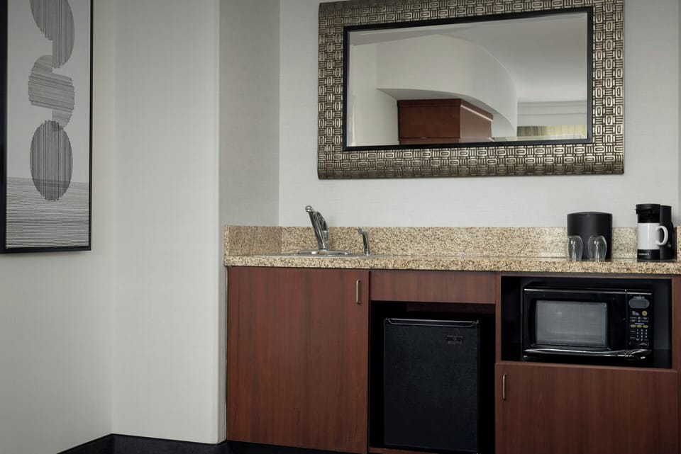 Suite, 1 Bedroom, Hearing Accessible | Desk, laptop workspace, iron/ironing board, free cribs/infant beds