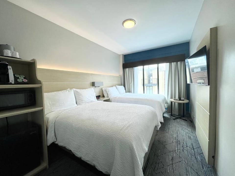 Standard Room, 2 Double Beds | Premium bedding, down comforters, laptop workspace, blackout drapes