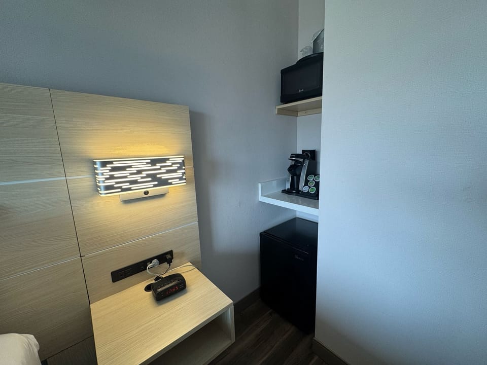 Premium bedding, down comforters, laptop workspace, blackout drapes