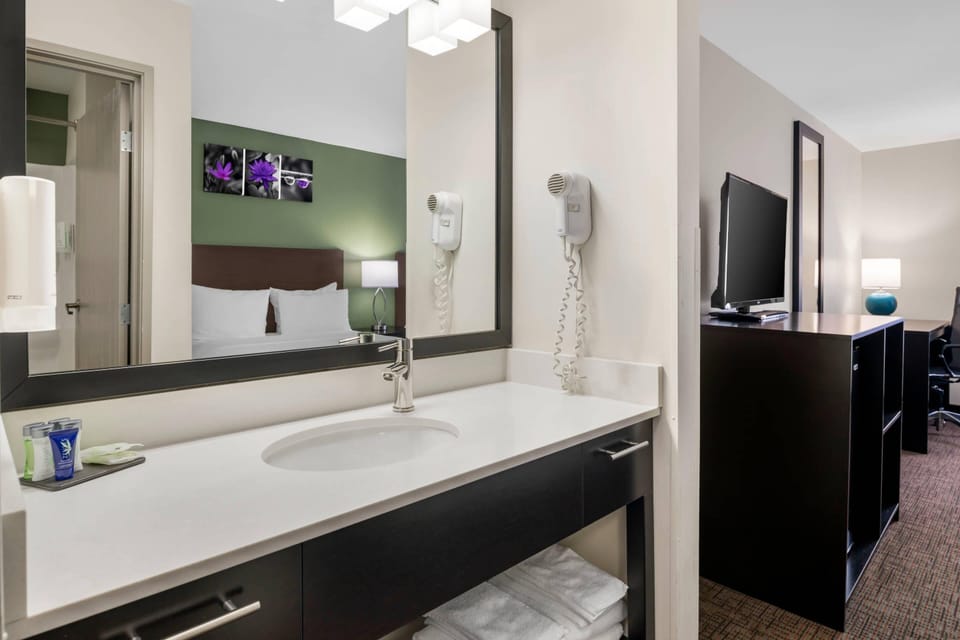 Room, 2 Queen Beds, Non Smoking | In-room safe, blackout drapes, iron/ironing board