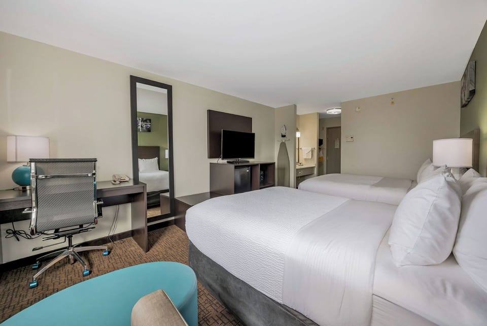 Room, 2 Queen Beds, Non Smoking | In-room safe, blackout drapes, iron/ironing board