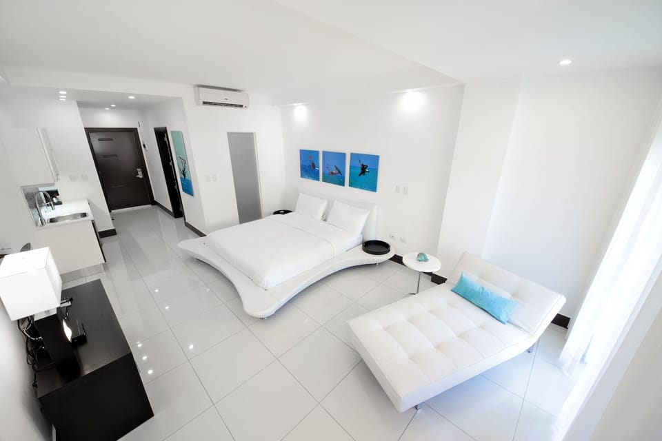 Junior Studio, 1 King Bed (Non- Ocean View) | In-room safe, laptop workspace, blackout drapes, iron/ironing board