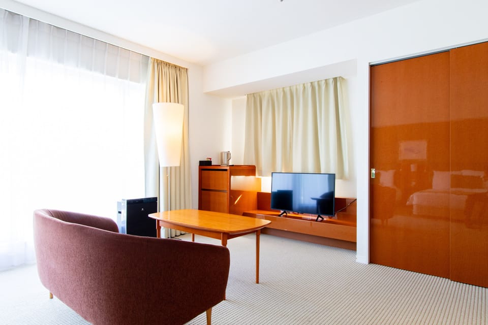 Premium bedding, down comforters, memory foam beds, in-room safe