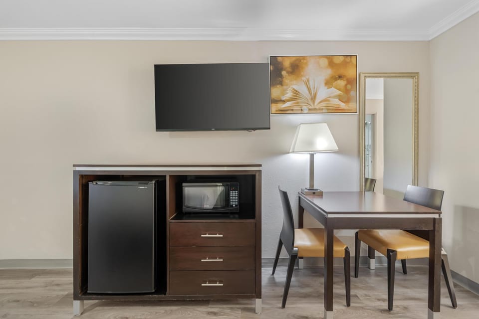 Standard Room, 2 Queen Beds, Non Smoking, Microwave | In-room safe, desk, laptop workspace, iron/ironing board