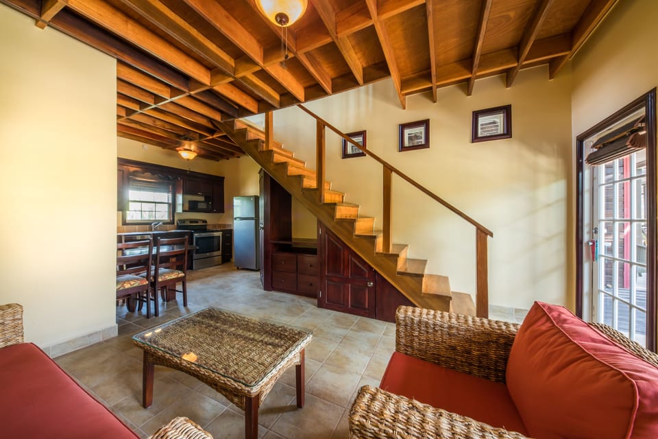 One Bedroom plus Den Garden View Villa | Living room | 32-inch TV with cable channels, Netflix, DVD player