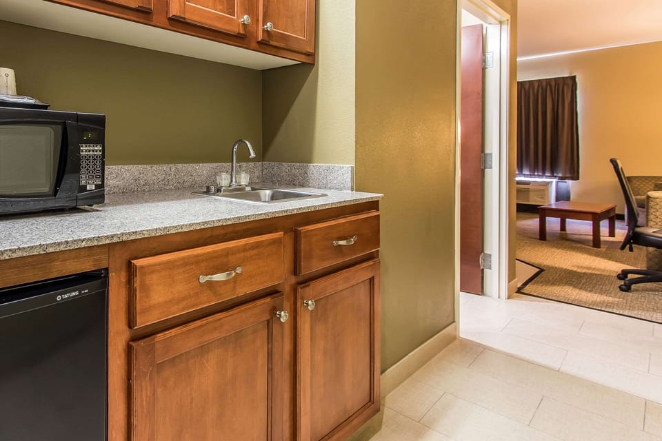 Suite, 2 Queen Beds, Non Smoking | Desk, iron/ironing board, WiFi (free), alarm clocks