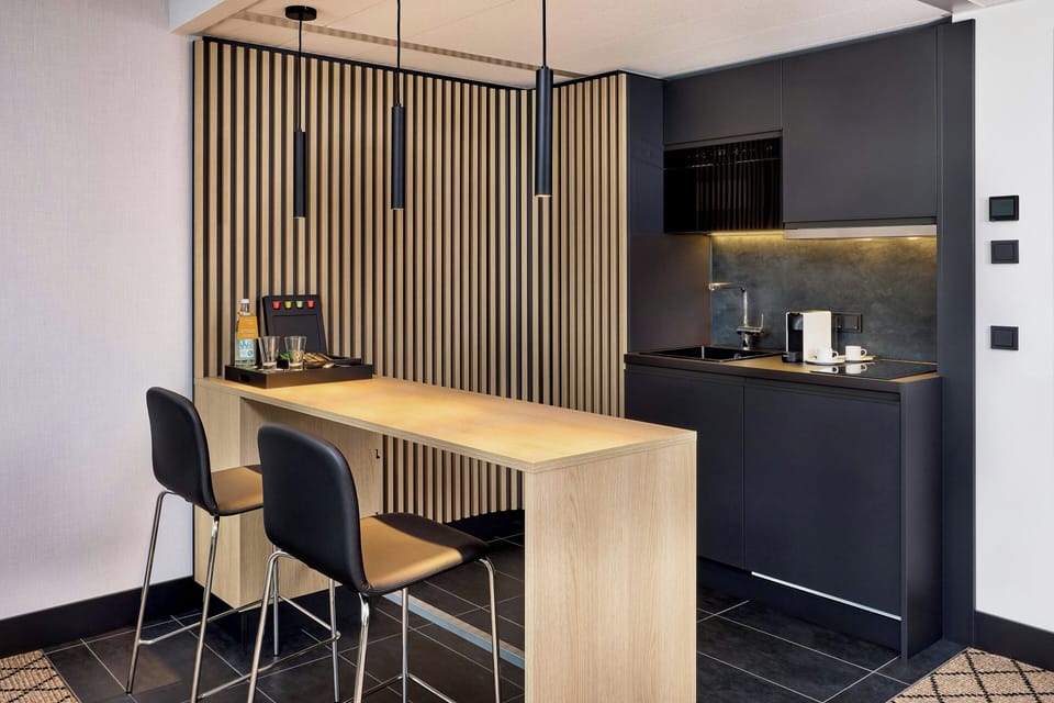 Suite, 1 King Bed, Lake View | Private kitchen | Fridge, coffee/tea maker, electric kettle