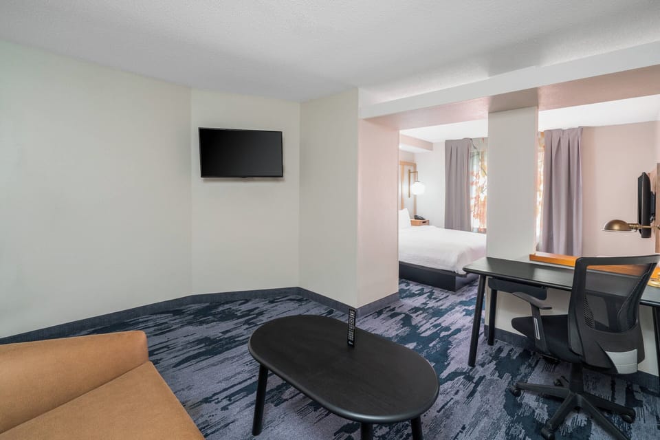 Suite, 1 King Bed with Sofa bed | Living area | 50-inch LCD TV with cable channels, TV, Netflix
