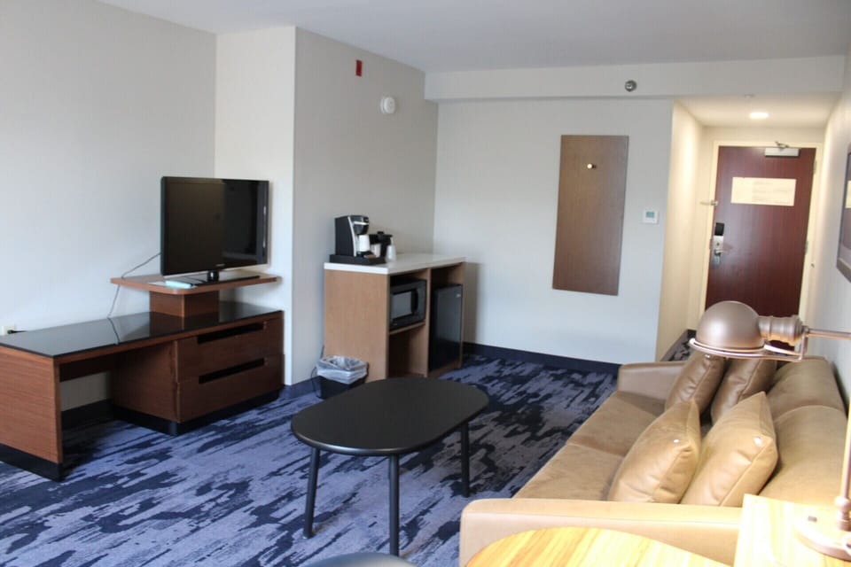 Executive Suite, 1 Bedroom | Living area | TV