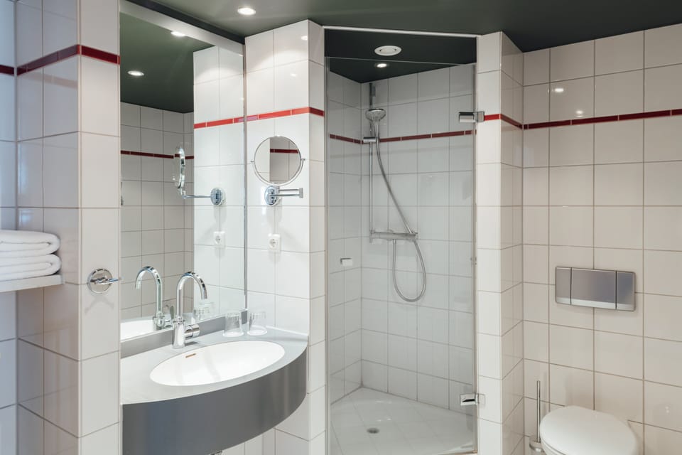 Shower, eco-friendly toiletries, hair dryer, towels