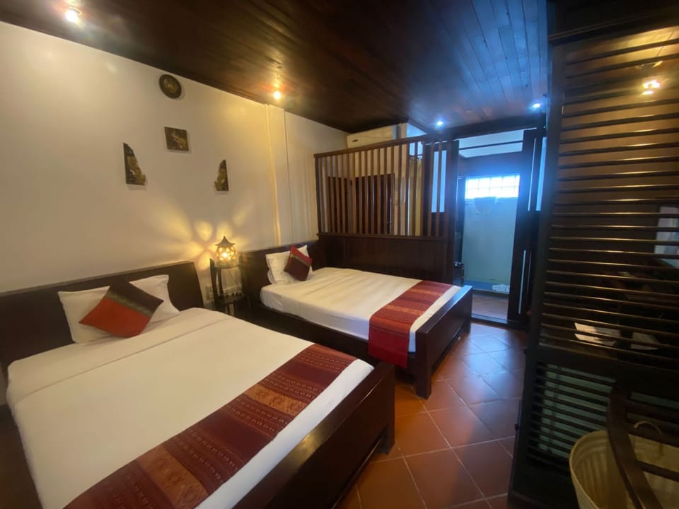 Deluxe Twin Room Pool View | Minibar, in-room safe, individually decorated, desk