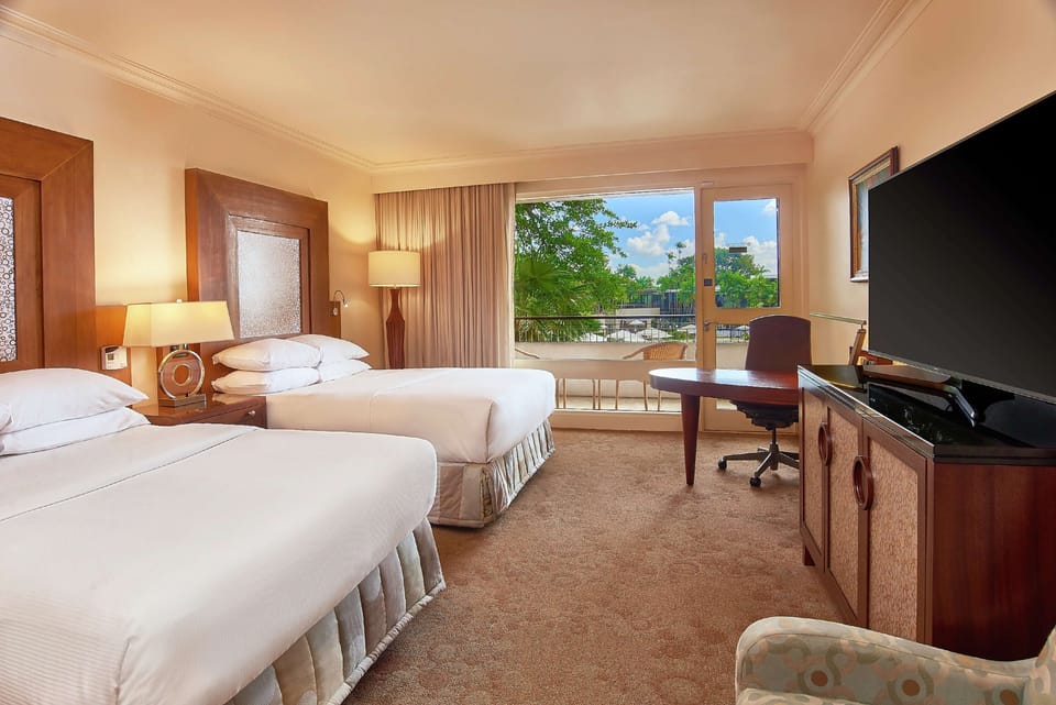 Deluxe Room, 2 Double Beds, Pool View | 1 bedroom, premium bedding, down comforters, pillowtop beds