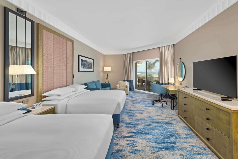 Deluxe Room, 2 Queen Beds, Sea View | Down comforters, minibar, in-room safe, desk