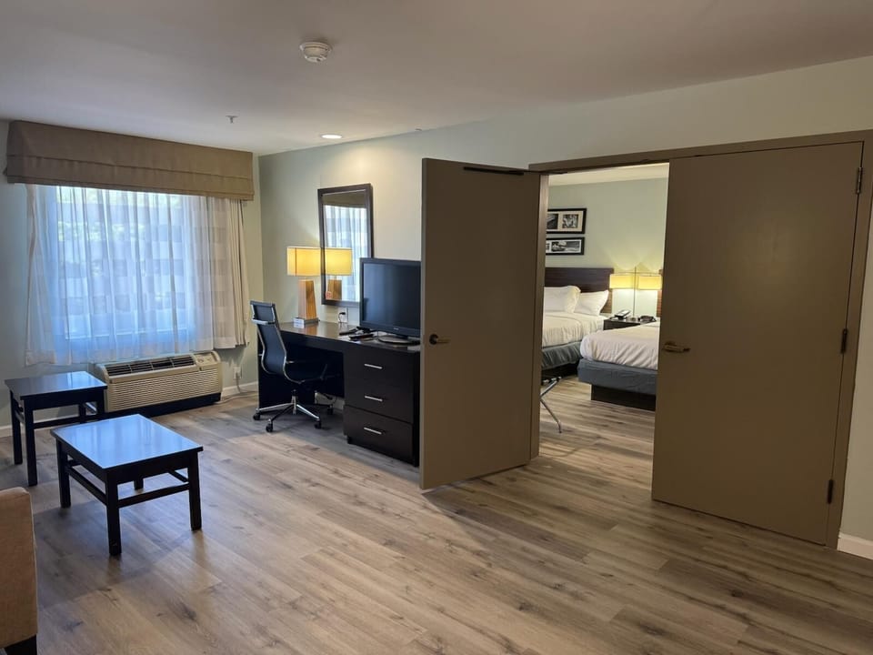 Suite, 2 Queen Beds, Non Smoking | In-room safe, desk, iron/ironing board, free WiFi