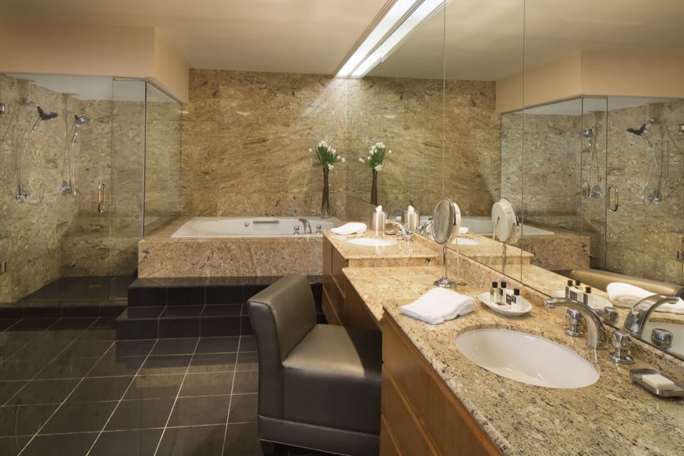 Designer toiletries, hair dryer, towels, soap