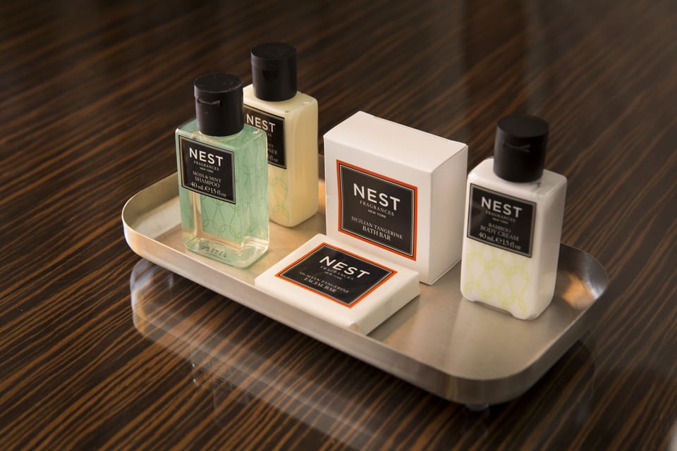 Designer toiletries, hair dryer, towels, soap