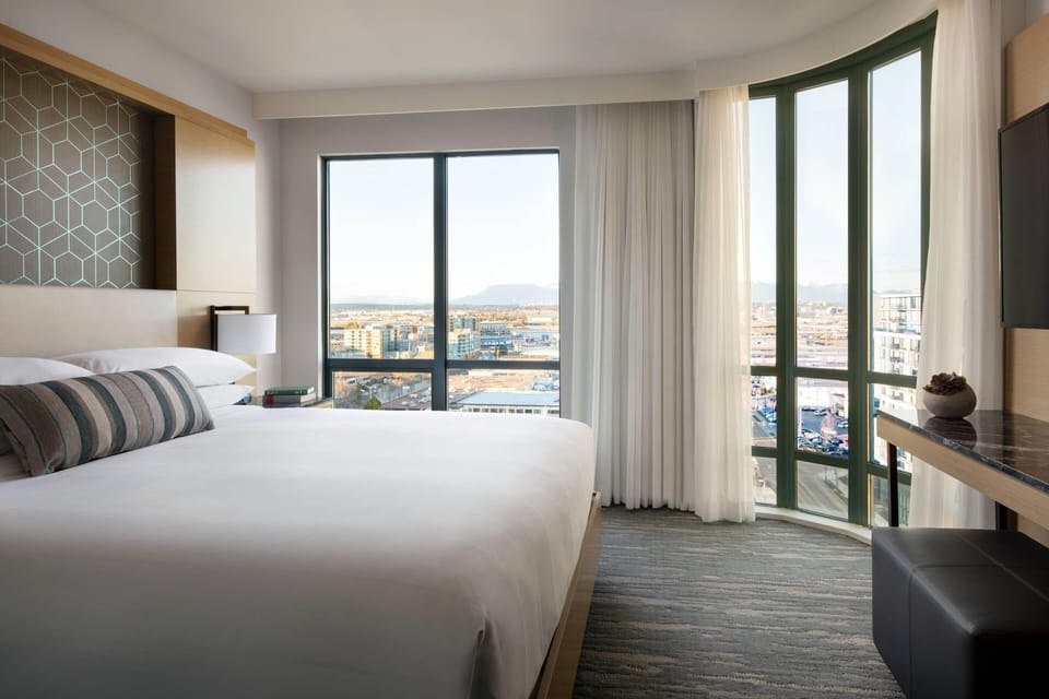 Premium bedding, down comforters, pillowtop beds, in-room safe