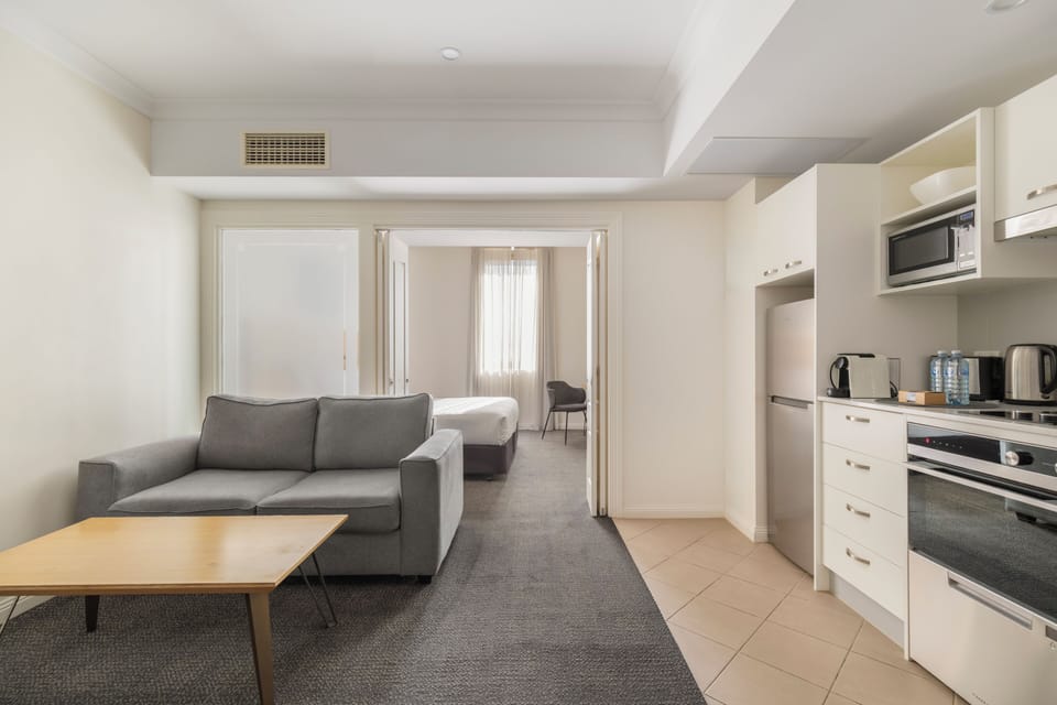 Apartment, 1 Bedroom (Spa Bath) | Living area | 32-inch TV with digital channels, Netflix, streaming services