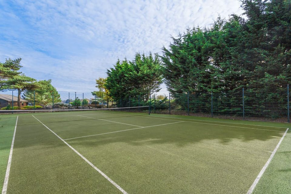 The tennis courts are wonderful in the summertime.