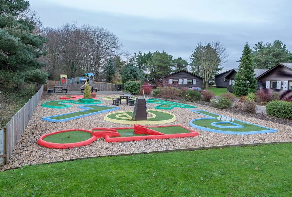The kids will love the outdoor play area, complete with a mini golf course!