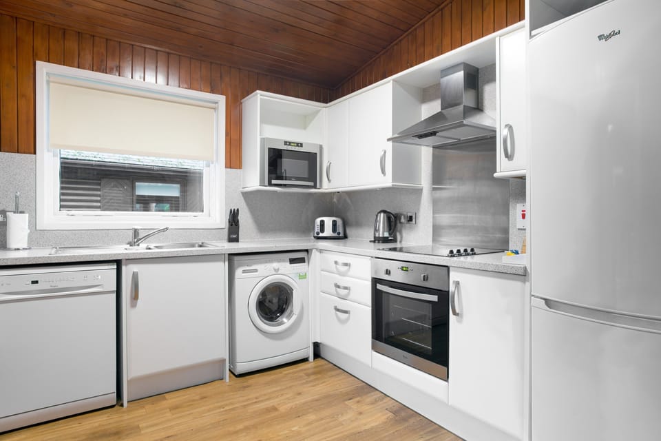 Prepare a meal in the equipped kitchen.