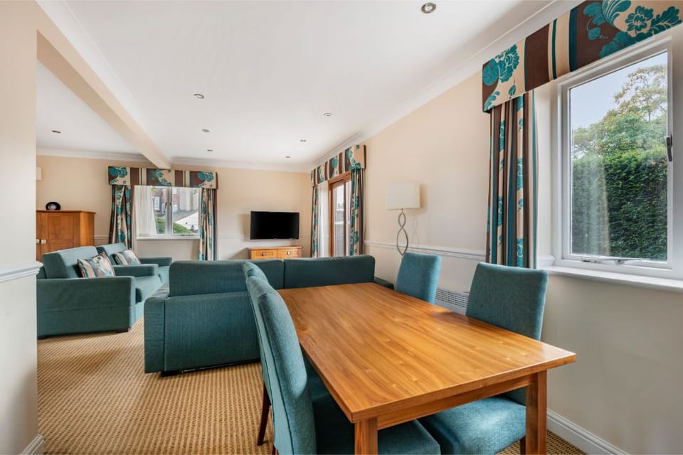 Dining area adjacent to the living space, perfect for meals and socializing.