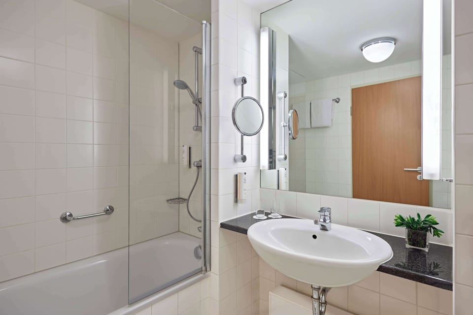 Combined shower/tub, eco-friendly toiletries, hair dryer, towels