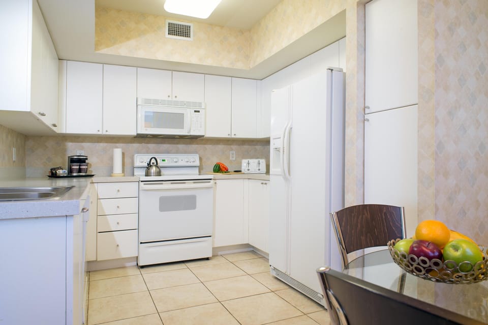 Fridge, microwave, coffee/tea maker, paper towels
