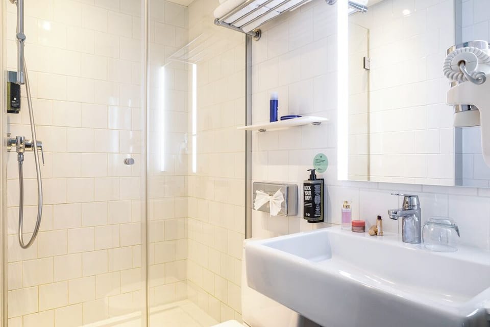 Eco-friendly toiletries, hair dryer, towels