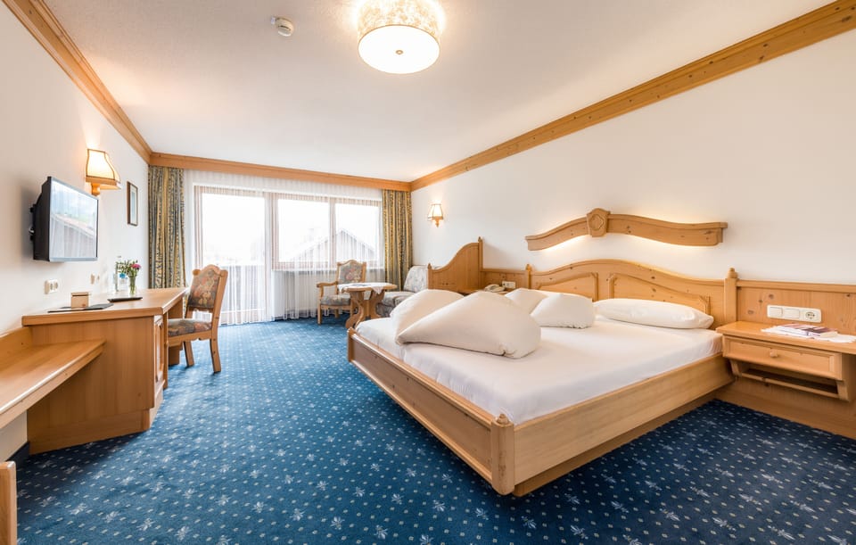 Comfort Double Room, Balcony, Mountain View | In-room safe, desk, cribs/infant beds, free WiFi
