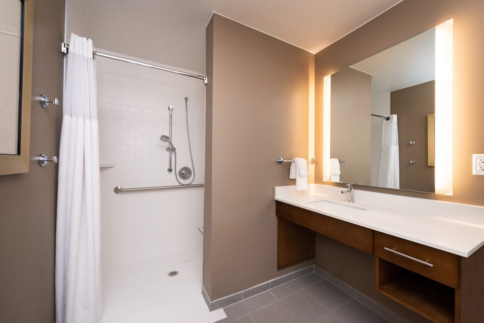 Get ready for your day in the lovely bathroom.