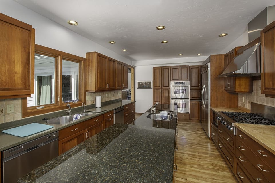 Kitchen, dual dishwashers, sinks and ovens, 8 burner stovetop.