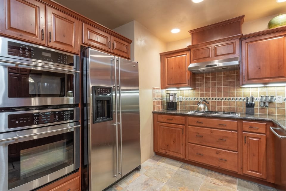 Built-in appliances surrounded by beautiful custom cabinetry!