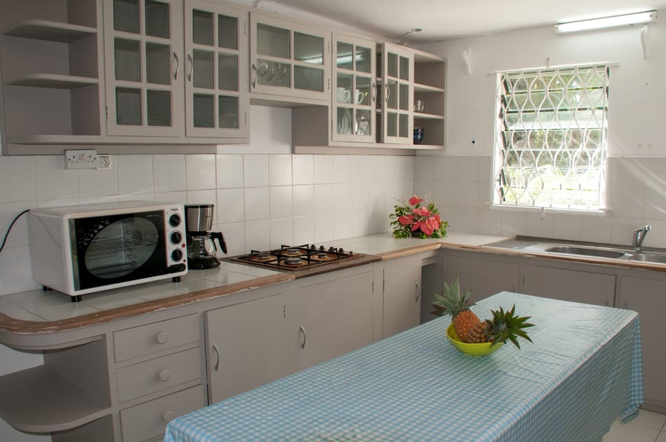 Apartment, 2 Bedrooms (Garden Side) | Private kitchen | Fridge, electric kettle