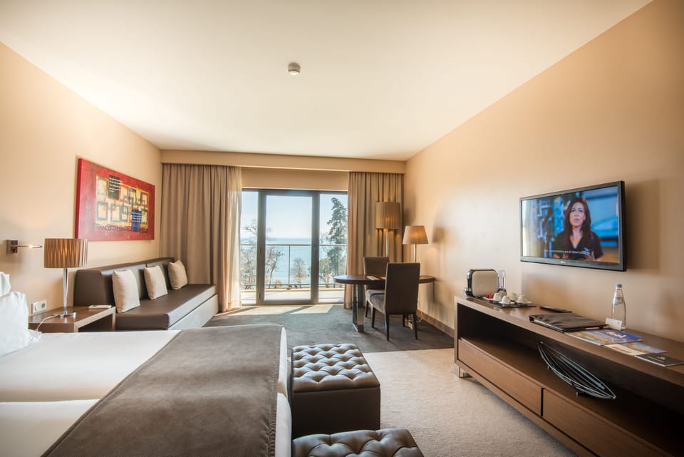 Premium Double or Twin Room, Balcony, Sea View | Minibar, in-room safe, individually decorated, desk