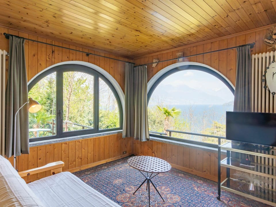 Property, Furniture, Window, Shade, Table, Wood, Plant, Lighting, Interior Design, Architecture