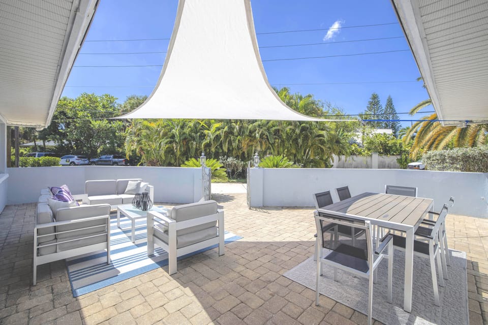 Private patio with alfresco dining and lounging.