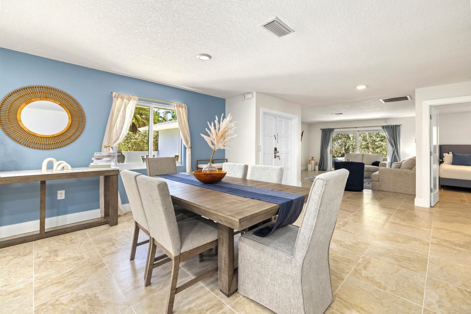 Seamlessly connected dining and living spaces, perfect for family meals or group gatherings.