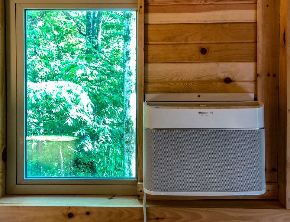 AC unit which cools entire cabin.