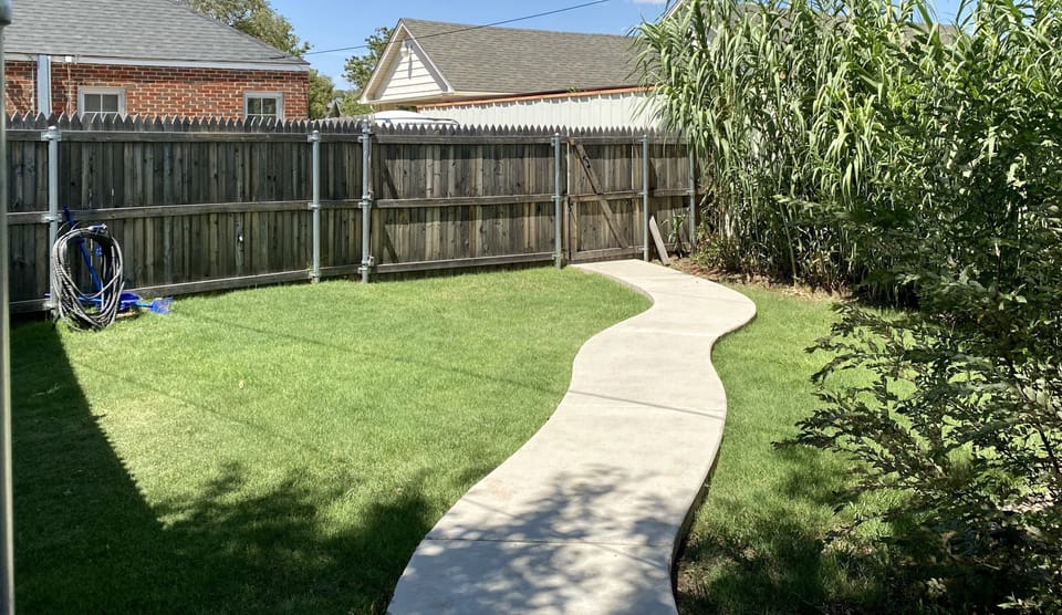 Private quiet yard for relaxing and/or your pup.