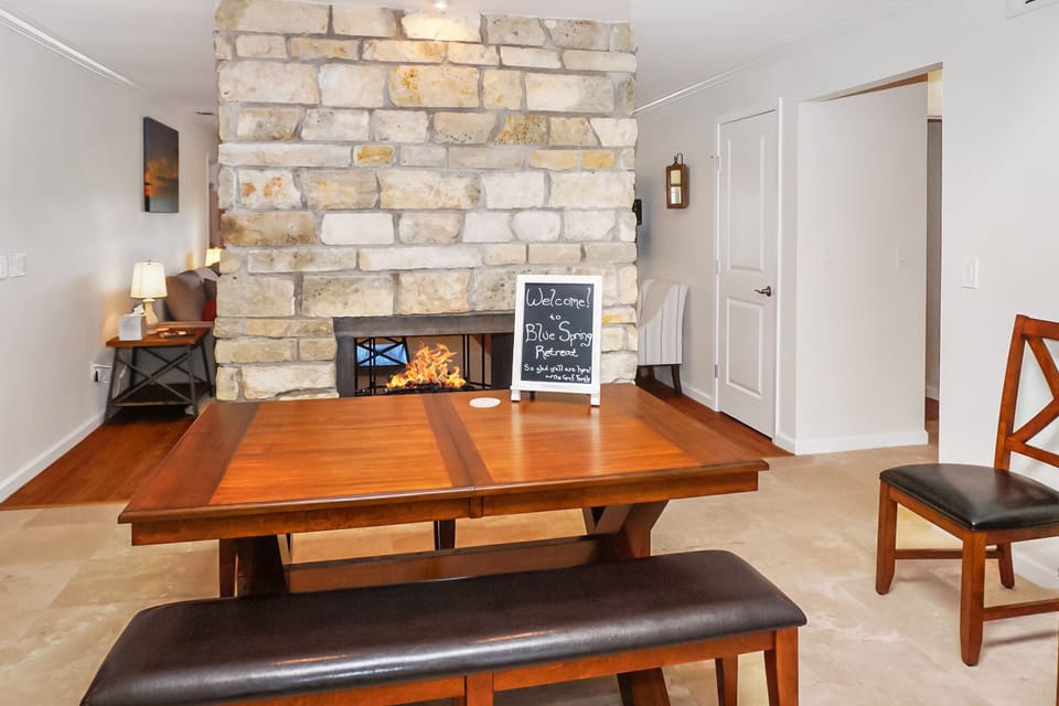 Double sided fireplace as you enter the home