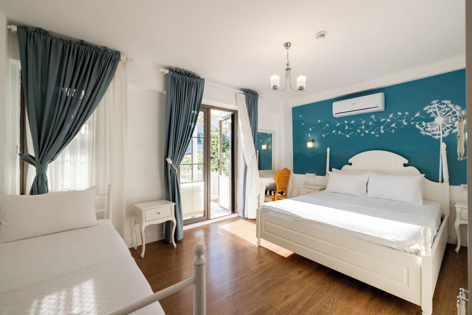 Deluxe Triple Room, Patio | Premium bedding, free WiFi, bed sheets