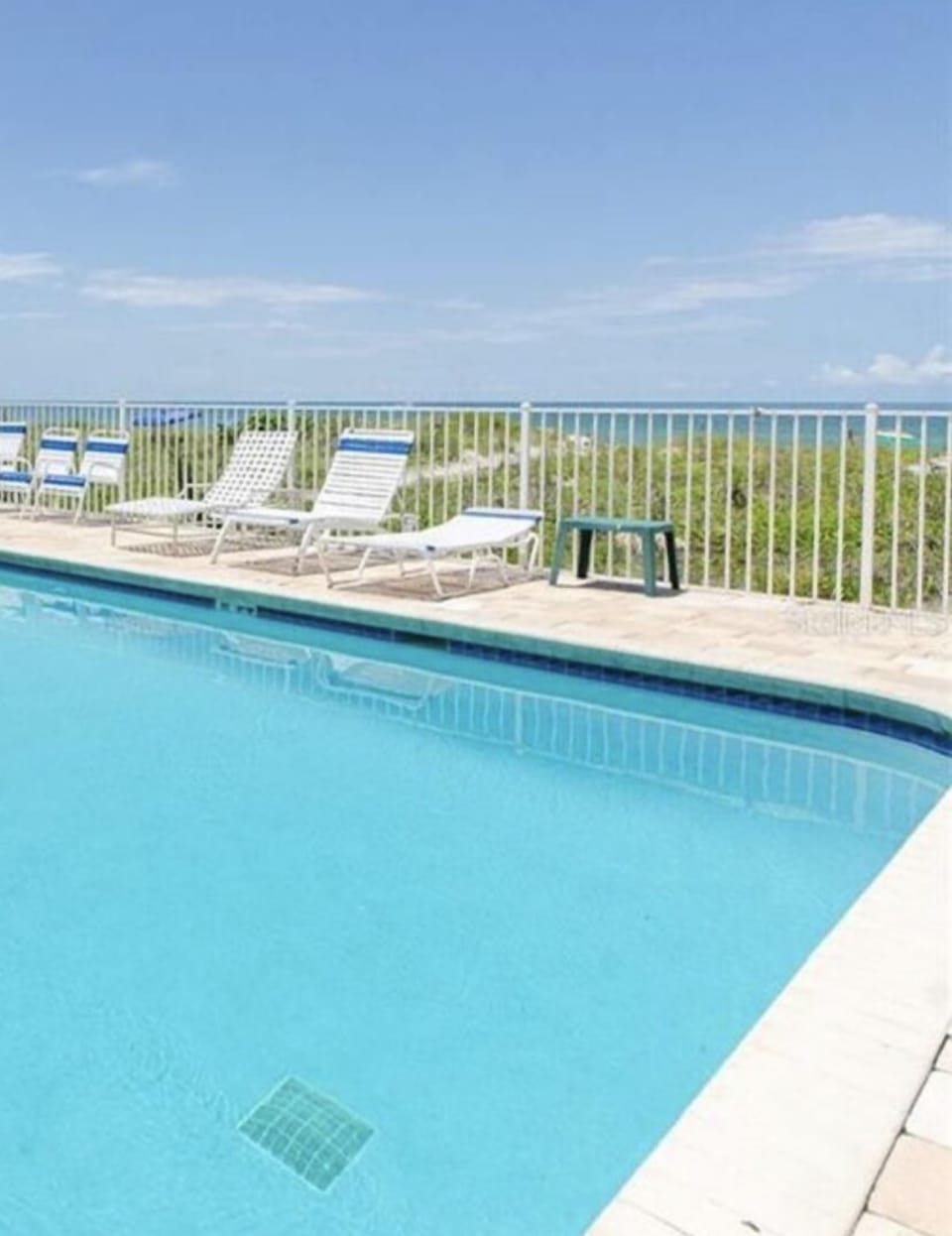 Heated pool right on Gulf