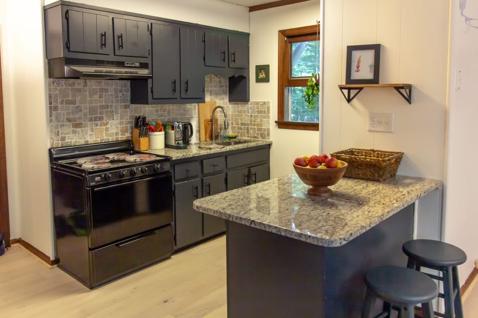 Rustic, open kitchen fully equipped with all your conveniences
