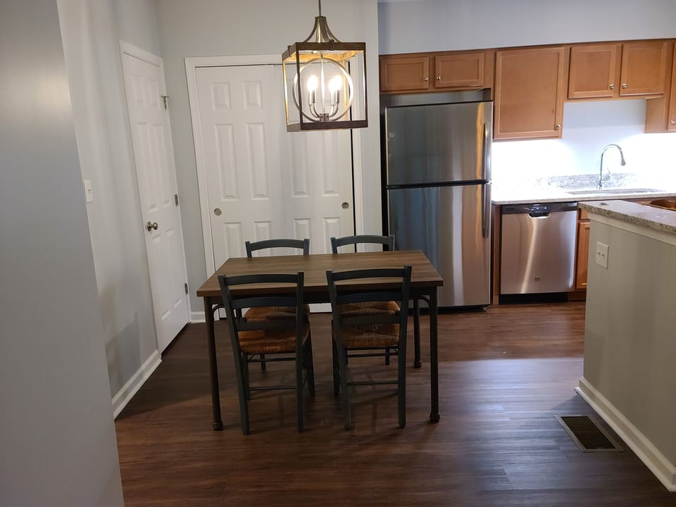 Dining table seats four.