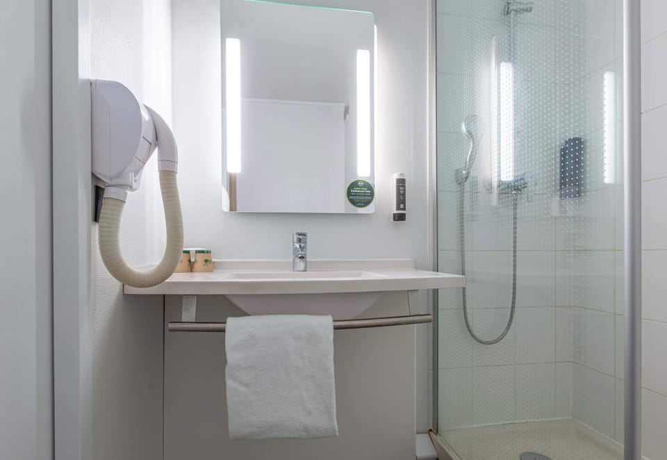 Shower, free toiletries, hair dryer, towels